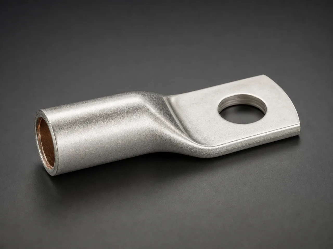 Unbranded tinned-metal compression cable lug with an open cylindrical barrel, flat palm and one circular stud hole.